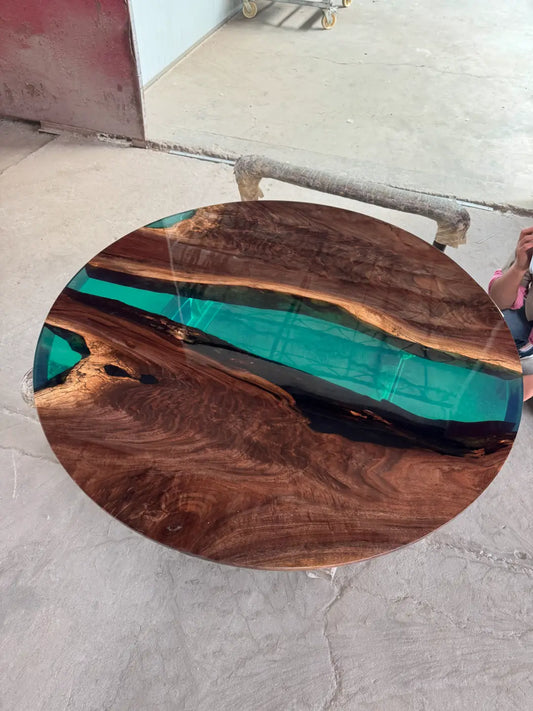 Flowepoxytable Custom Black Walnut Epoxy Resin River Dining Table RT006 shown with its handcrafted round resin surface
